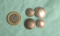 2 zilveren manchetknopen met muntjes van