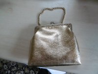 Klein goudkleurig handtasje in perfecte staat,