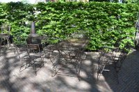 Smeedijzeren tuinmeubelen stoelen leunstoelen tafel lang