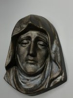 Mooi bronzen hoofd van Maria. 
