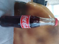 Glazen Coca-Cola flesje,ongeopend, zie info